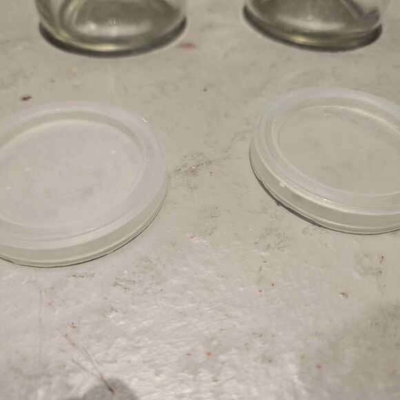 Crate & Barrel Creamery Clear Glass Carafe Jar Lids 2oz 3-1/4" Set of 2 - Picture 5 of 5